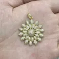Gold flower pendant detail view, showing intricate pave rhinestone petals and sparkling center. - A1-Multi-Layer Petal Style / Gold