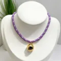 Exquisite purple braided rope necklace with irregular gold pendant and purple cubic zirconia. - Necklace (With Pendant and Chain) / White and Purple Braided Rope