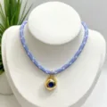 Blue and white woven rope necklace with irregular gold plated pendant and dark blue zircon stone. - Necklace (With Pendant and Chain) / Blue and White Braided Rope