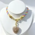 Natural stone crystal heart carved pendant necklace with colorful braided cord and zircon accents. - Colorful Pendant Necklace