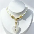 Exquisite white carved crystal heart pendant necklace with gold hardware and braided rope chain. - White Pendant Necklace