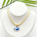 Close-up detail of the gold-toned twisted chain necklace featuring a blue and white cloud pendant. - K02-8 (Pendant + Chain in Picture)