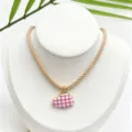 Closeup detail of cute pink grid cloud pendant necklace with beige twisted rope chain accessory. - K02-7 (Pendant + Chain in Picture)