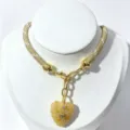 Chic woven cord necklace with gold tone hardware and carved yellow heart stone pendant for women. - Yellow Stone Pendant Necklace