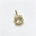 Detail view of a square champagne cubic zirconia pendant with 18k gold plated copper. - F-012 White