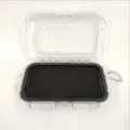 Waterproof clear storage box detail view, showing open protective case and black foam interior. - Large Transparent