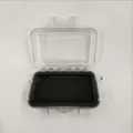 Transparent waterproof outdoor storage box with black cushioning foam pad, detail view. - Small Transparent