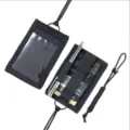 Tactical ID badge holder detail view, durable nylon material with a clear window. - Black