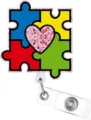 Acrylic glitter autism awareness badge reel featuring colorful puzzle pieces and pink heart. - Jigsaw Puzzle