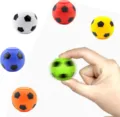 Close-up detail of colorful soccer fidget spinner toy showing various bright color options. - 4cm Soccer Spinner