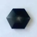 Detail view of black hexagonal metal kinetic desk toy piece, smooth matte surface for stress relief. - Hexagon / 48.7g / Black