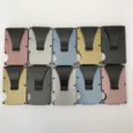 Carbon fiber RFID wallet detail showing multi-color card holder variants and money clip. - Colour