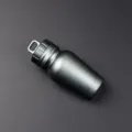 Close-up detail shot of the portable waterproof pill capsule container, sleek metallic finish. - Gray
