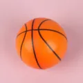 Mini PU foam basketball stress relief toy, textured detail showing soft bouncy material. - 6cm / Basketball