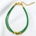 Bracciale a più strati intrecciato verde con perline metalliche dorate e ciondolo farfalla. - 15# (Verde Scuro)