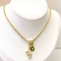 Gold plated DIY necklace featuring paved zircon tube bead, cat pendant and green flower charm. - Zirconia Animal and Daisy Style (Model 09#) / Pendant and Necklace Set / Gold