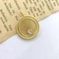 Exquisite vintage gold round sunburst pendant necklace accessory featuring pink crystal. - Style E