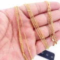 Detailed shot of 18K gold-plated beaded satellite chains, fashion DIY jewelry accessories. - Gold