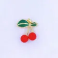 Exquisite red cherry pendant detail close-up, gold-plated metal green leaf charm DIY jewelry accessory. - Style G