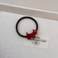 Lindo coletero de pelo con perrito Scottie de acrílico y pedrería, banda elástica marrón oscura - Goma de Pelo Cachorro Rojo