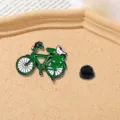 Vintage green bicycle enamel pin with dove and schoolbag, perfect retro fashion clothing badge. - Bicycle Style (CZ0140)