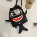 Cartoon shark backpack for men and women, cute black drawstring school bag with big teeth. - Black