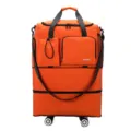 Large capacity orange folding travel luggage bag with universal wheels and multiple outer pockets. - Orange
