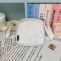 White crossbody bag with silver star pattern, casual shoulder bag for women daily use. - White