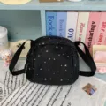 Casual black crossbody bag with white star pattern, lightweight daily canvas shoulder bag - Black