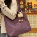 Purple canvas tote bag for women, casual shoulder handbag with cute plush pendant and embroidery. - With Cookie Charm / Purple
