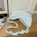 Light blue canvas crescent shoulder bag, cute bow embroidered dumpling bag for daily commute. - Basic Style / Blue