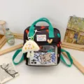 Cute black backpack with colorful hearts, green straps, clear pocket and cute plush charm. - Black (No Pendant)