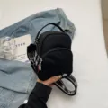 Zaino nero mini casual da donna, elegante borsa in nylon per uso quotidiano e tempo libero. - Nero