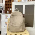 Solid color casual backpack for women and students, lightweight daily travel school bag. - L / Brown Large
