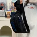 Black canvas chest bag, stylish casual crossbody bag with blue letters and adjustable strap. - Black