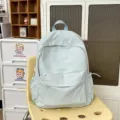 Light blue casual solid color backpack, minimalist school bag for students and daily travel. - L / Blue Large
