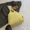 Yellow canvas casual backpack for women, stylish minimalist travel daily shoulder bag. - Yellow