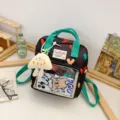 Cute kawaii mini backpack with heart print and clear front pocket, lightweight casual daypack - Black + Cheese Pendant