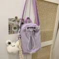 Lockerer lila Mini Kordelzug Rucksack fur Damen niedliches Design tragbare Becher Tasche - Lila mit Anhänger