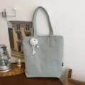 Casual sage green canvas tote bag with cute plush pendant, large capacity shoulder bag. - Single Bag Only / Light Blue