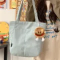 Casual canvas tote bag for women, large capacity shoulder bag with cute burger pendant. - With Long Leg Hamburger Coin Purse / Blue