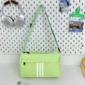 Minimalist light green canvas crossbody bag with sporty three-stripe design for casual travel daily use. - Regular Fit / Green