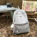 Lightweight grey backpack for women, large capacity daily school bag for students and travel. - Backpack (With Ice Cream Lanyard) / Dark Gray