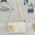 Casual canvas messenger bag large capacity shoulder bag for women daily travel stylish use - With Long-Legged Cookie Pendant / Off White