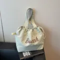 Bolso tote de lona ligero para mujer, bolso de hombro grande con diseño de cordón. - Verde