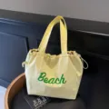 Bolso tote de lona amarilla para mujer, bolso de hombro grande para viajes y uso diario. - Amarillo