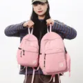Lightweight waterproof foldable pink backpack for women, perfect for travel, fitness and casual use. - L / Pink