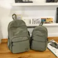 Minimalist mini waterproof lightweight fitness backpack in green grid design for women SKU - Green