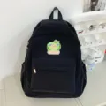 Black casual canvas backpack with cute cartoon patch, perfect for daily student travel. - Black Large
