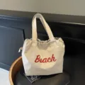 Bolso tote grande de lona casual para mujer, bolso de hombro con estampado de playa para el trabajo. - Caqui
